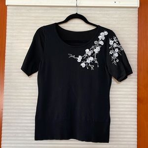 White House black market short sleeve, black sweater, top floral embellishment M